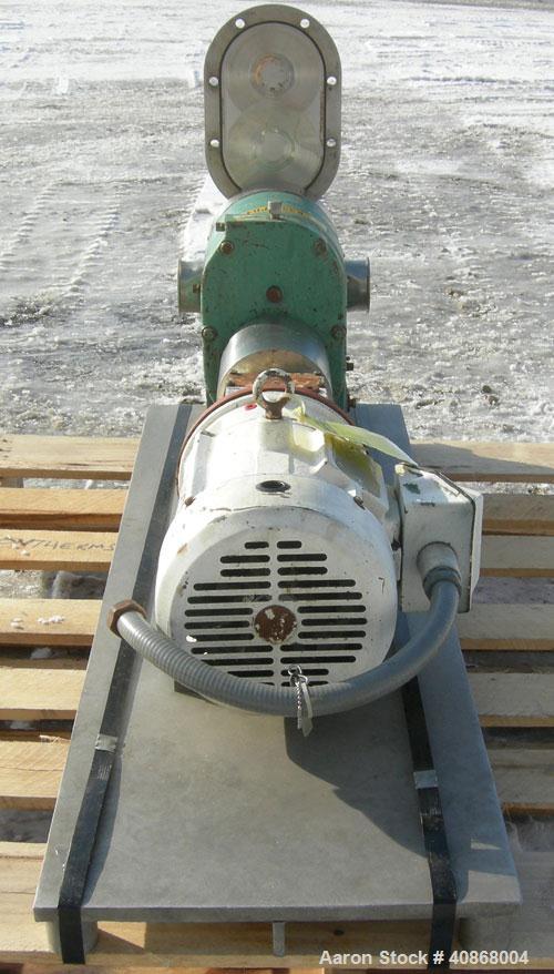 Used Tri-Clover Rotary Positive Displacement Pump, 316 stainless steel. Approximately 60 gallons per minute at 20 psi. 3" tri-clamp inlet/outlet. (2) 4 lobe stainless steel rotors. Driven by a 5 hp, ...