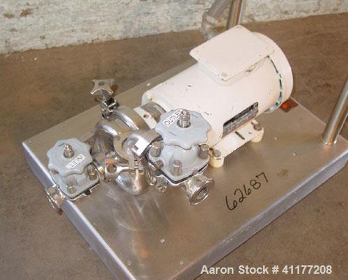 Used Cherry Burrell Model 4AK-F Flex Flo Stainless Pump. 1 in inlet / outlet, 2 hp, 208-230/460 motor, stainless steel cart.