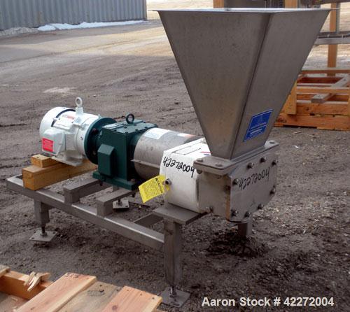 Used APV Rectangular Inlet Top Feed Rotary Positive Displacement Pump, model R6RH, 316 stainless steel. Approximate capacity 150 gallons per minute at 600 rpm. 67.2 cubic inch displacement per revolu...