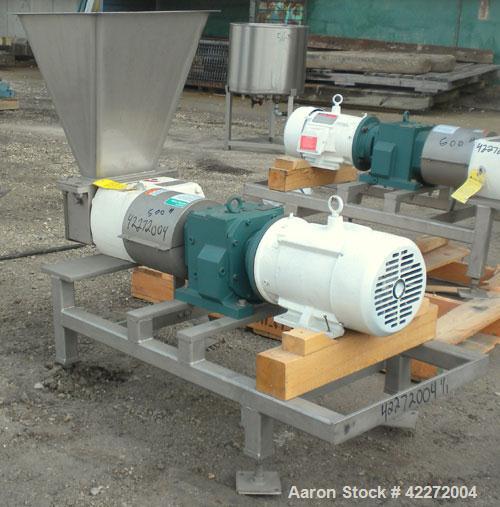 Used APV Rectangular Inlet Top Feed Rotary Positive Displacement Pump, model R6RH, 316 stainless steel. Approximate capacity 150 gallons per minute at 600 rpm. 67.2 cubic inch displacement per revolu...