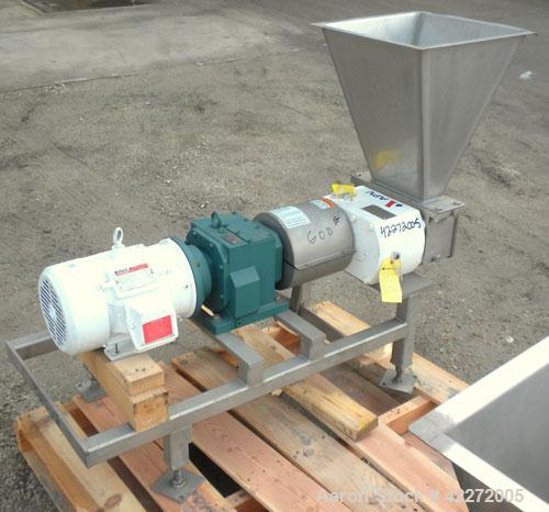 Used APV Rectangular Inlet Top Feed Rotary Positive Displacement Pump, model R6RH, 316 stainless steel. Approximate capacity 150 gallons per minute at 600 rpm. 67.2 cubic inch displacement per revolu...
