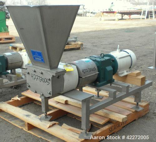 Used APV Rectangular Inlet Top Feed Rotary Positive Displacement Pump, model R6RH, 316 stainless steel. Approximate capacity 150 gallons per minute at 600 rpm. 67.2 cubic inch displacement per revolu...
