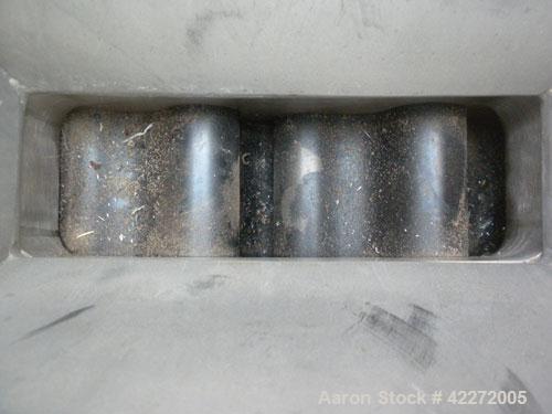 Used APV Rectangular Inlet Top Feed Rotary Positive Displacement Pump, model R6RH, 316 stainless steel. Approximate capacity 150 gallons per minute at 600 rpm. 67.2 cubic inch displacement per revolu...