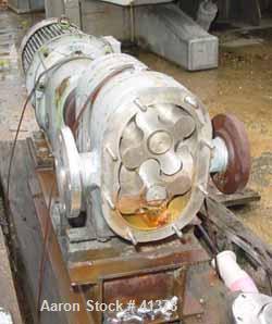 Used- Rotary Lobe Positive Displacement Pump, 316 Stainless Steel. Approximately 60 gallons per minute. 2" inlet/outlet. (2)...