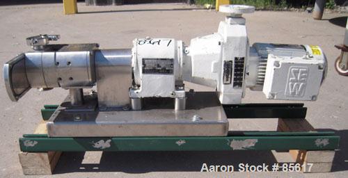 Used Flowtech Unibloc Rotary Positive Displacement Pump, Model 5000, Series 300, 316 Stainless Steel, Horizontal. Approximate 28 gallons per minute capacity. 1" tri-clamp inlet/outlet. (2) 2 lobe sta...