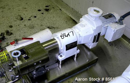 Used Flowtech Unibloc Rotary Positive Displacement Pump, Model 5000, Series 300, 316 Stainless Steel, Horizontal. Approximate 28 gallons per minute capacity. 1" tri-clamp inlet/outlet. (2) 2 lobe sta...