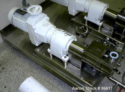 Used Flowtech Unibloc Rotary Positive Displacement Pump, Model 5000, Series 300, 316 Stainless Steel, Horizontal. Approximate 28 gallons per minute capacity. 1" tri-clamp inlet/outlet. (2) 2 lobe sta...
