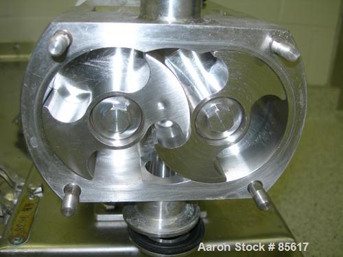 Used Flowtech Unibloc Rotary Positive Displacement Pump, Model 5000, Series 300, 316 Stainless Steel, Horizontal. Approximate 28 gallons per minute capacity. 1" tri-clamp inlet/outlet. (2) 2 lobe sta...