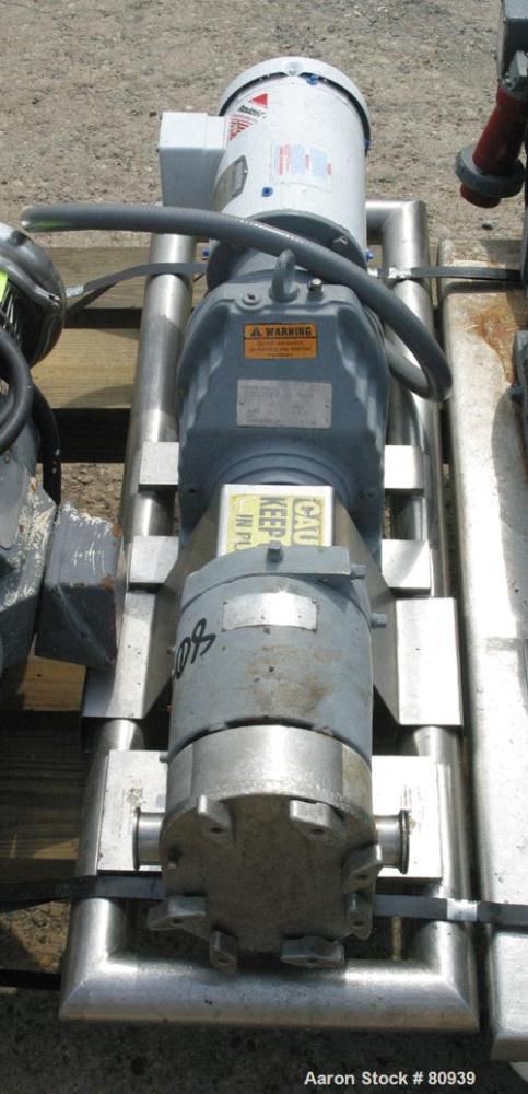 USED: Tri Clover rotary positive displacement pump, model PR25-112M- UH4-S, 316 stainless steel. Approximately 28 gallons per minute at 20 psi. 2" tri-clamp inlet/outlet. (2) 4 lobe rubber rotors, ra...