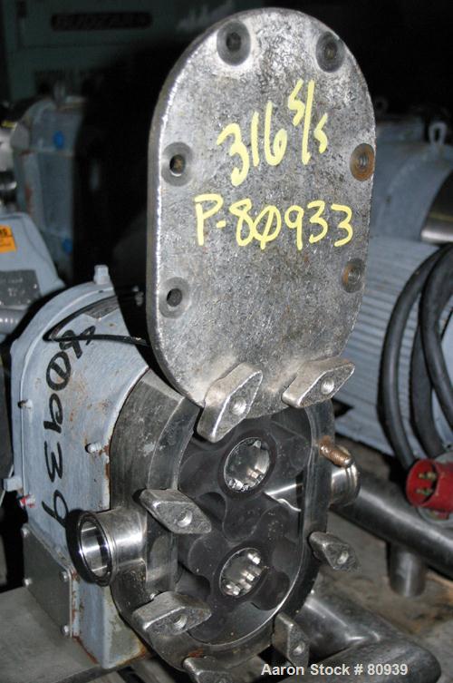 USED: Tri Clover rotary positive displacement pump, model PR25-112M- UH4-S, 316 stainless steel. Approximately 28 gallons per minute at 20 psi. 2" tri-clamp inlet/outlet. (2) 4 lobe rubber rotors, ra...
