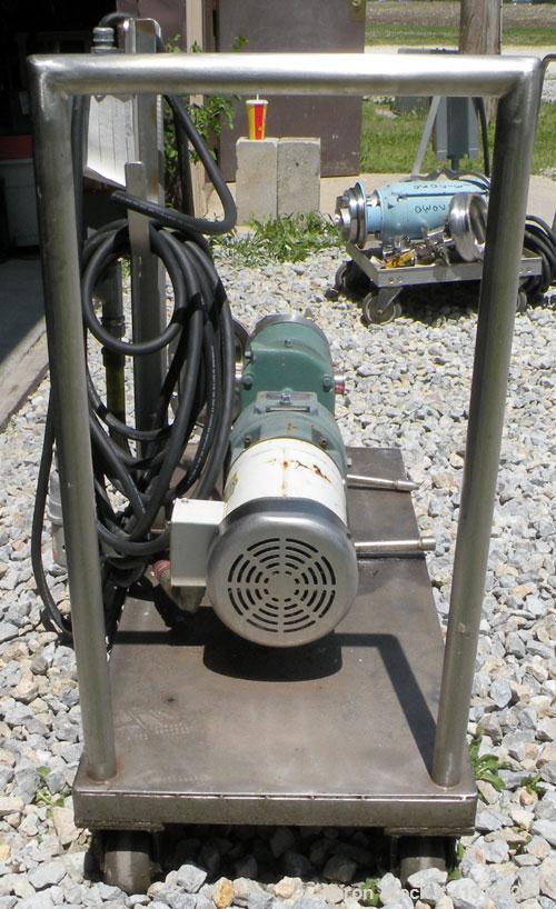 Used Tri-Clover Positive Displacement Pump, 316 Stainless Steel Housing. 1 1/2" tri-clamp inlet/outlet. Rubber rotors. Driven by a 2 hp, 3/60/208-230/460 volt, 1740 rpm motor thru Dodge gear reducer,...