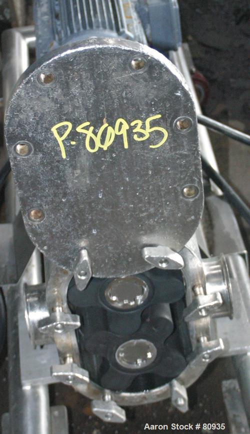 USED:Tri Clover rotary positive displacement pump, 316 stainless steel. 3-1/2" tri-clamp inlet/outlet. (2) 4 lobe rubber rotors. Driven by a 7.5 hp, 3/60/230/460 volt, 1720 rpm motor thru an SM-Beier...