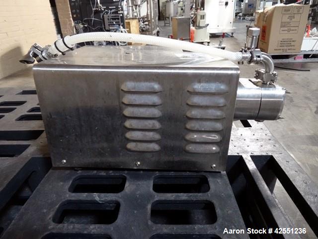 Used Unibloc PD Labtop Rotary Lobe Pump, Model 250, Stainless Steel. Has polyflex plastic rotors, 1" inlet/outlet. Approximately 8 gpm with integrally motor with vfd controller. 104-126 volt. Serial#...