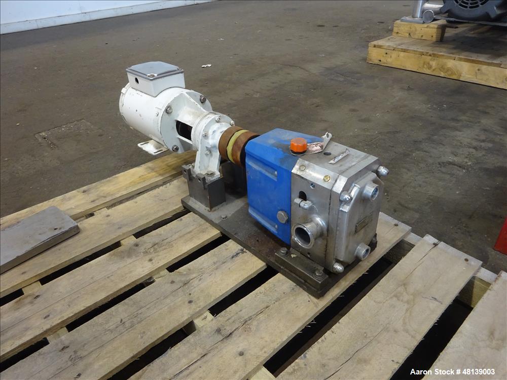 Used Viking Duralobe Bi-Rotor Positive Displacement Pump, Model R2S, 316 Stainless Steel. Approximate 26 gallons per minute. 1-1/2" Inlet & outlet, (2) rotors. Driven by a 0.5hp, 3/60/208-230/460 vol...