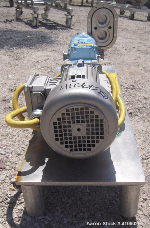 Used Waukesha Rotary Positive   Displacement  Pump, Model 006, 316 Stainless Steel. Approximately 6 gallons per minute at 200 psi at 800 rpm capacity, .0082 gallon displacement per revolution. 1 1/2"...