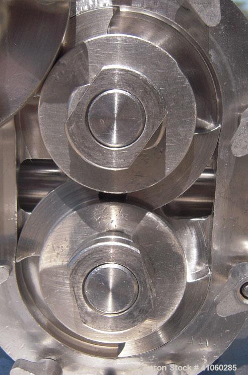 Used Waukesha Rotary Positive   Displacement  Pump, Model 006, 316 Stainless Steel. Approximately 6 gallons per minute at 200 psi at 800 rpm capacity, .0082 gallon displacement per revolution. 1 1/2"...