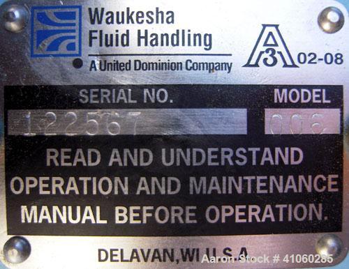 Used Waukesha Rotary Positive   Displacement  Pump, Model 006, 316 Stainless Steel. Approximately 6 gallons per minute at 200 psi at 800 rpm capacity, .0082 gallon displacement per revolution. 1 1/2"...
