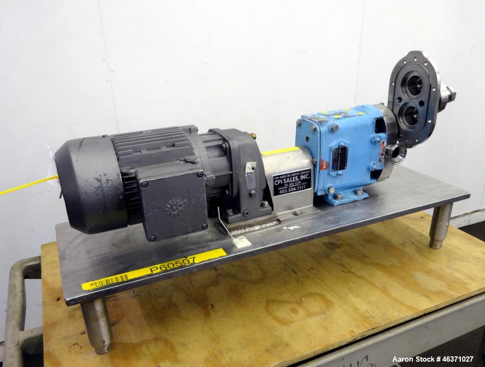 Used Waukesha Rotary Positive Displacement Pump, Model 006, 316 Stainless Steel. Approximately 6 gallons per minute at 200 psi at 800 rpm capacity, (.0082) gallon displacement per revolution. 1" Tri-...