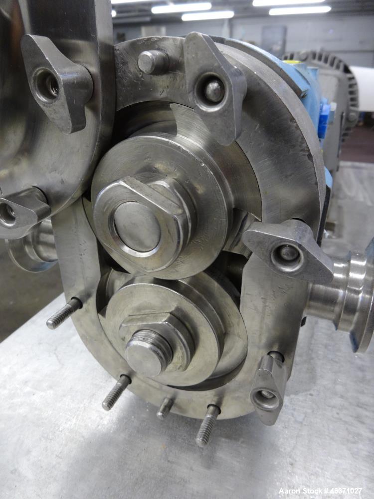 Used Waukesha Rotary Positive Displacement Pump, Model 006, 316 Stainless Steel. Approximately 6 gallons per minute at 200 psi at 800 rpm capacity, (.0082) gallon displacement per revolution. 1" Tri-...