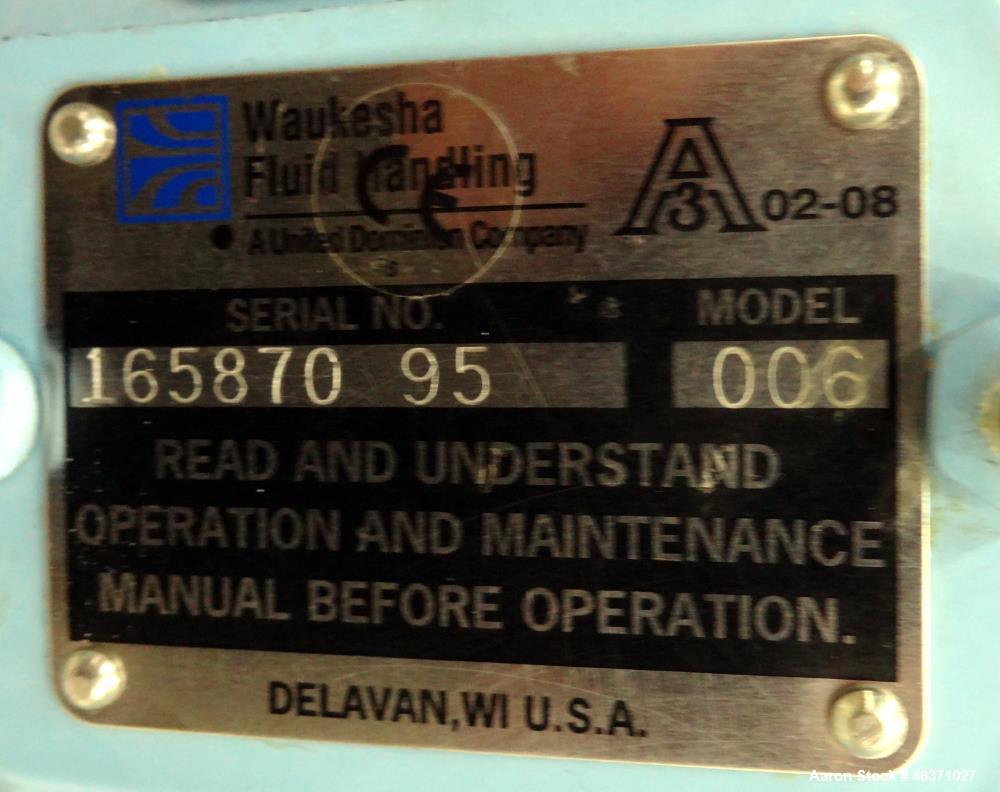 Used Waukesha Rotary Positive Displacement Pump, Model 006, 316 Stainless Steel. Approximately 6 gallons per minute at 200 psi at 800 rpm capacity, (.0082) gallon displacement per revolution. 1" Tri-...