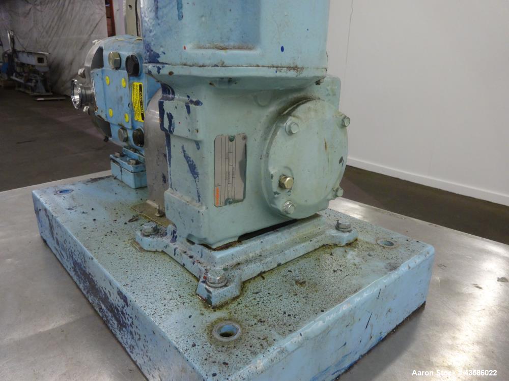 Used Waukesha Positive Displacement Pump, Model 015U2AP, 316 Stainless Steel. 1-1/2" Tri-clamp inlet/outlet, (2) stainless steel rotors. Driven  by a 1-1/2 hp, 3/60/230/460 volt, 1740 rpm XP gear mot...