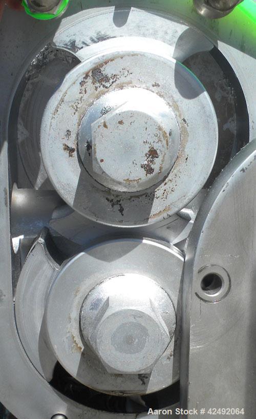 Used Waukesha Rotary Positive Displacement Pump, Model 030/U2, 316 Stainless Steel. Approximately 36 gallons per minute at 100 psi at 600 rpm capacity, (.06) gallon displacement per revolution. 1-1/2...
