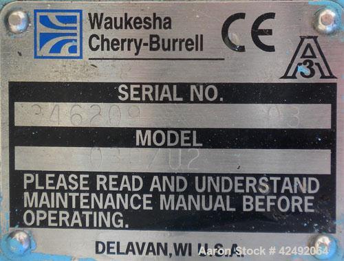 Used Waukesha Rotary Positive Displacement Pump, Model 030/U2, 316 Stainless Steel. Approximately 36 gallons per minute at 100 psi at 600 rpm capacity, (.06) gallon displacement per revolution. 1-1/2...