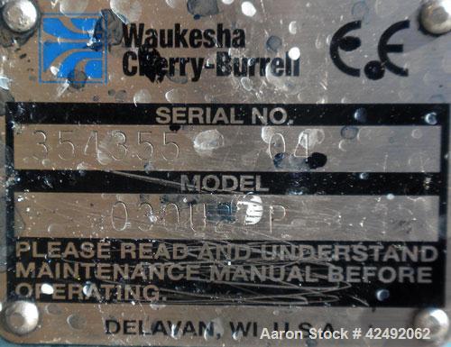 Used Waukesha Rotary Positive Displacement Pump, Model 030U2-AP, 316 Stainless Steel. Approximately 36 gallons per minute at 100 psi at 600 rpm capacity, .06 gallon displacement per revolution. 1-1/2...