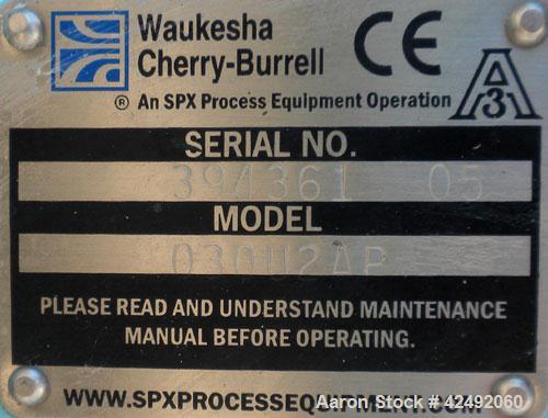 Used Waukesha Rotary Positive Displacement Pump, Model 030U2AP, 316 Stainless Steel. Approximately 36 gallons per minute at 100 psi at 600 rpm capacity, .06 gallon displacement per revolution. 1-1/2"...