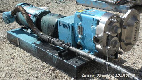 Used Waukesha Rotary Positive Displacement Pump, Model 030U2AP, 316 Stainless Steel. Approximately 36 gallons per minute at 100 psi at 600 rpm capacity, .06 gallon displacement per revolution. 1-1/2"...