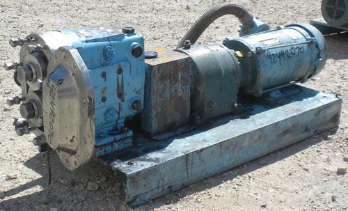 Used Waukesha Rotary Positive Displacement Pump, Model 030U2AP, 316 Stainless Steel. Approximately 36 gallons per minute at 100 psi at 600 rpm capacity, .06 gallon displacement per revolution. 1-1/2"...