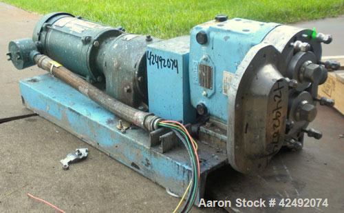 Used Waukesha Rotary Positive Displacement Pump, Model 030U2AP, 316 Stainless Steel. Approximately 36 gallons per minute at 100 psi at 600 rpm capacity, .06 gallon displacement per revolution. 1-1/2"...