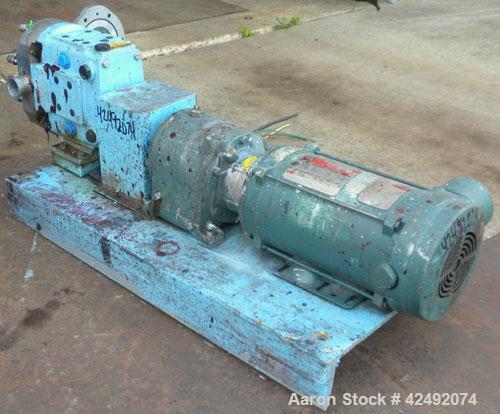 Used Waukesha Rotary Positive Displacement Pump, Model 030U2AP, 316 Stainless Steel. Approximately 36 gallons per minute at 100 psi at 600 rpm capacity, .06 gallon displacement per revolution. 1-1/2"...