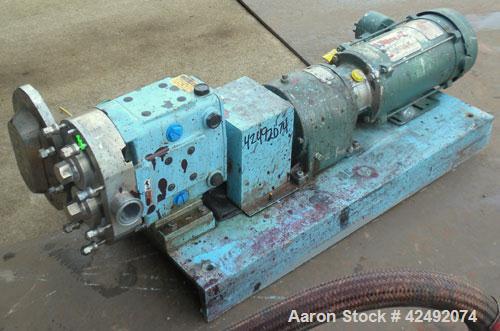 Used Waukesha Rotary Positive Displacement Pump, Model 030U2AP, 316 Stainless Steel. Approximately 36 gallons per minute at 100 psi at 600 rpm capacity, .06 gallon displacement per revolution. 1-1/2"...