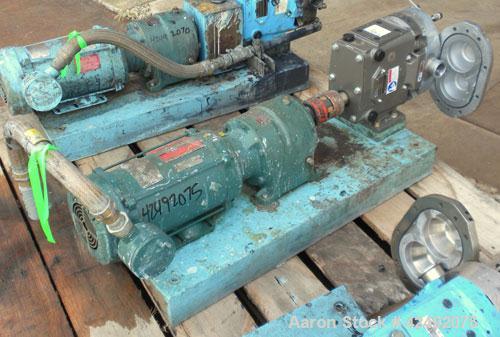 Used Waukesha Rotary Positive Displacement Pump, Model 030U2AP, 316 Stainless Steel. Approximately 36 gallons per minute at 100 psi at 600 rpm capacity, .06 gallon displacement per revolution. 1-1/2"...