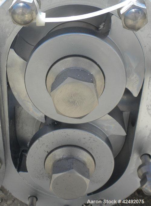 Used Waukesha Rotary Positive Displacement Pump, Model 030U2AP, 316 Stainless Steel. Approximately 36 gallons per minute at 100 psi at 600 rpm capacity, .06 gallon displacement per revolution. 1-1/2"...
