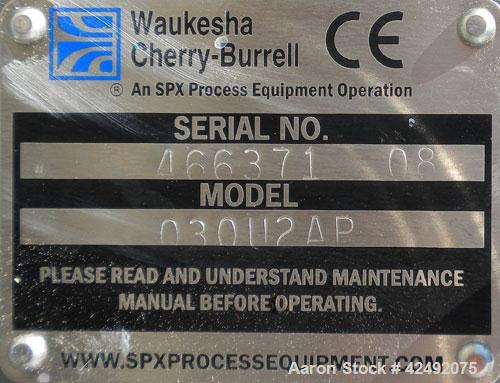 Used Waukesha Rotary Positive Displacement Pump, Model 030U2AP, 316 Stainless Steel. Approximately 36 gallons per minute at 100 psi at 600 rpm capacity, .06 gallon displacement per revolution. 1-1/2"...