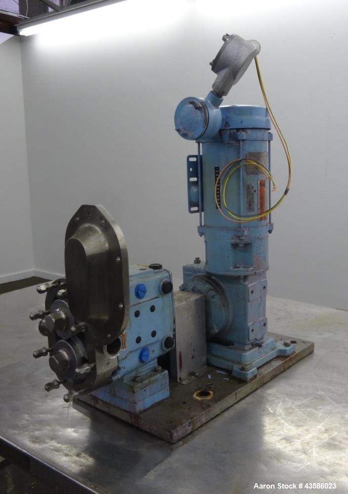 Used Waukesha Positive Displacement Pump, Model 030U2AP, 316 Stainless Steel. 1-1/2" Tri-clamp inlet/outlet, (2) stainless steel rotors. Driven  by a 2 hp, 3/60/230/460 volt, 1740 rpm XP gear motor, ...