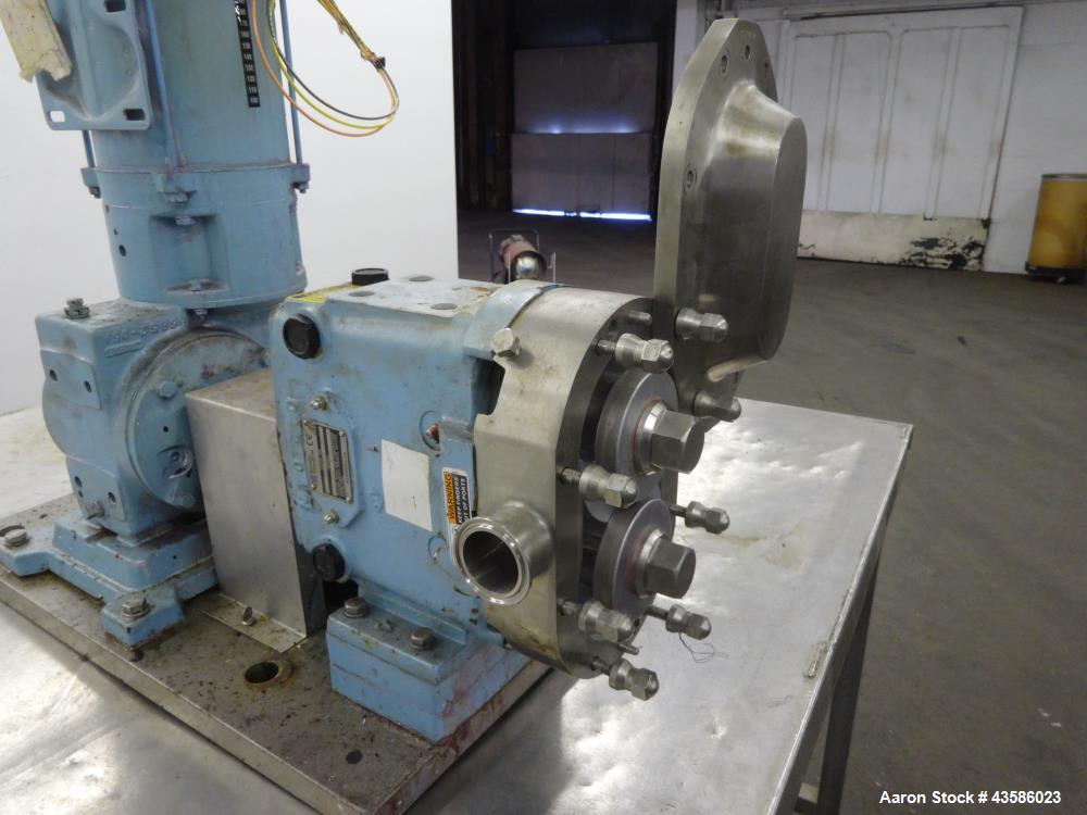 Used Waukesha Positive Displacement Pump, Model 030U2AP, 316 Stainless Steel. 1-1/2" Tri-clamp inlet/outlet, (2) stainless steel rotors. Driven  by a 2 hp, 3/60/230/460 volt, 1740 rpm XP gear motor, ...