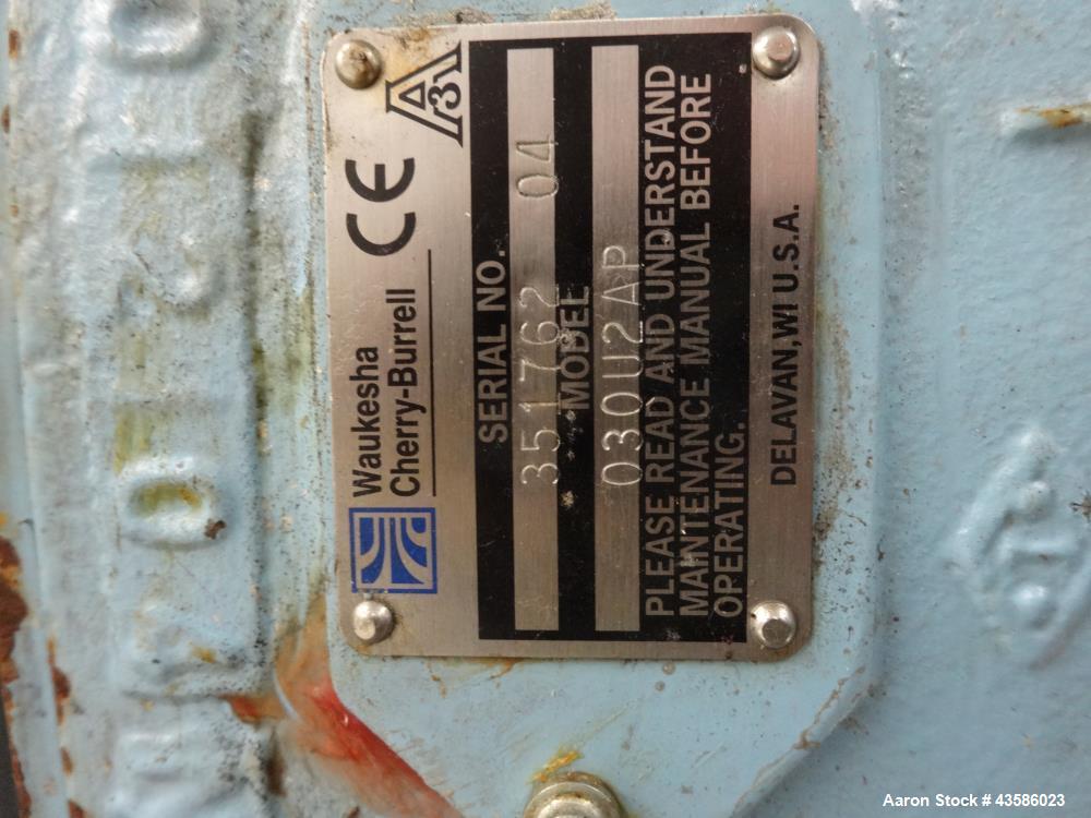 Used Waukesha Positive Displacement Pump, Model 030U2AP, 316 Stainless Steel. 1-1/2" Tri-clamp inlet/outlet, (2) stainless steel rotors. Driven  by a 2 hp, 3/60/230/460 volt, 1740 rpm XP gear motor, ...