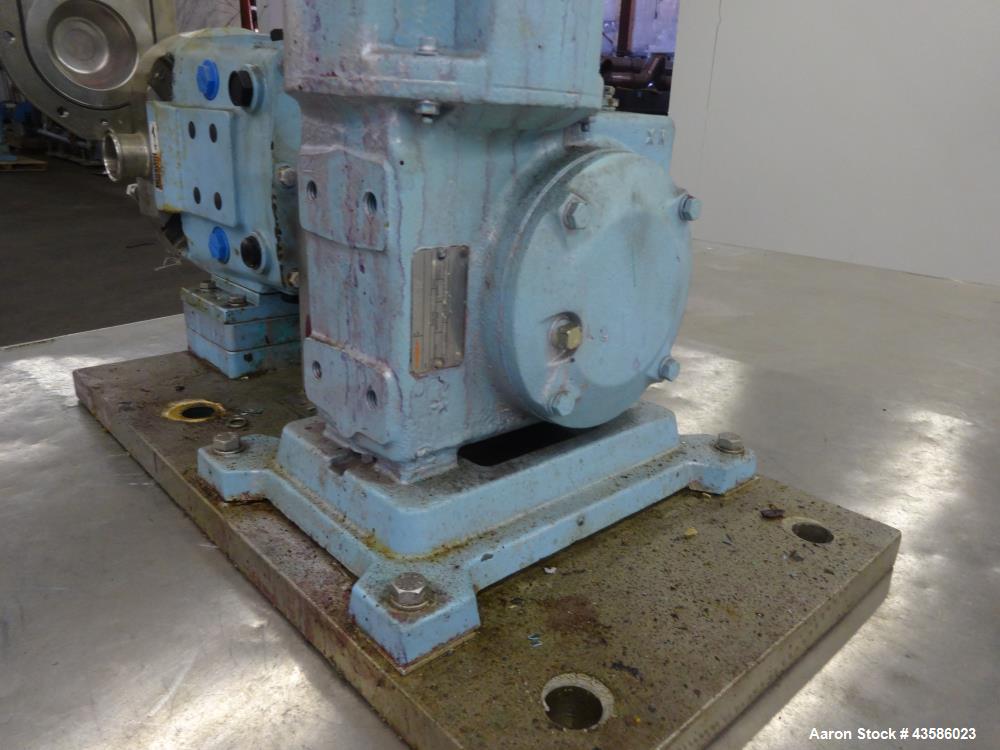 Used Waukesha Positive Displacement Pump, Model 030U2AP, 316 Stainless Steel. 1-1/2" Tri-clamp inlet/outlet, (2) stainless steel rotors. Driven  by a 2 hp, 3/60/230/460 volt, 1740 rpm XP gear motor, ...