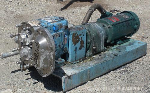 Used Waukesha Rotary Positive Displacement Pump, Model 030U2, 316 Stainless Steel. Approximately 36 gallons per minute at 100 psi at 600 rpm capacity, (.06) gallon displacement per revolution. 1-1/2"...