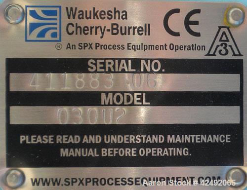 Used Waukesha Rotary Positive Displacement Pump, Model 030U2, 316 Stainless Steel. Approximately 36 gallons per minute at 100 psi at 600 rpm capacity, (.06) gallon displacement per revolution. 1-1/2"...