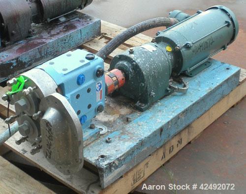 Used Waukesha Rotary Positive Displacement Pump, Model 030U2, 316 Stainless Steel. Approximately 36 gallons per minute at 100 psi at 600 rpm capacity, (.06) gallon displacement per revolution. 1-1/2"...