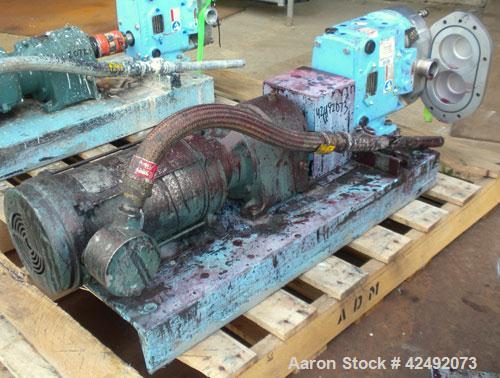Used Waukesha Rotary Positive Displacement Pump, Model 030U2, 316 Stainless Steel. Approximately 36 gallons per minute at 100 psi at 600 rpm capacity, (.06) gallon displacement per revolution. 1-1/2"...