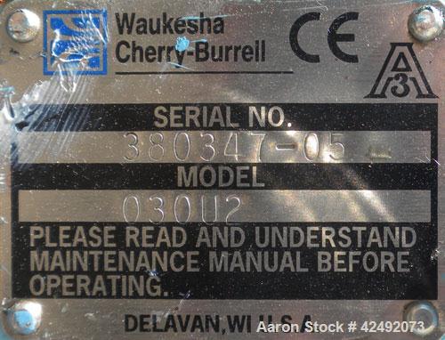 Used Waukesha Rotary Positive Displacement Pump, Model 030U2, 316 Stainless Steel. Approximately 36 gallons per minute at 100 psi at 600 rpm capacity, (.06) gallon displacement per revolution. 1-1/2"...