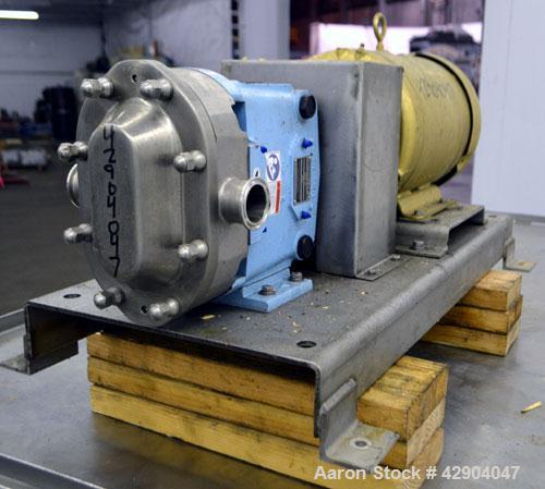 Used Waukesha Universal 2 Rotary Positive Displacement Pump, Model 030U2, 316 Stainless Steel. Approximate capacity 36 gallons per minute 200 psi at 600 rpm. (.060) Gallon displacement per revolution...