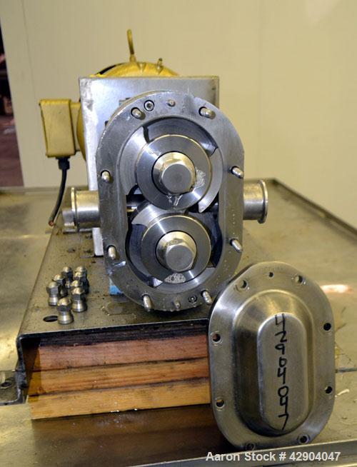Used Waukesha Universal 2 Rotary Positive Displacement Pump, Model 030U2, 316 Stainless Steel. Approximate capacity 36 gallons per minute 200 psi at 600 rpm. (.060) Gallon displacement per revolution...