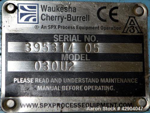 Used Waukesha Universal 2 Rotary Positive Displacement Pump, Model 030U2, 316 Stainless Steel. Approximate capacity 36 gallons per minute 200 psi at 600 rpm. (.060) Gallon displacement per revolution...