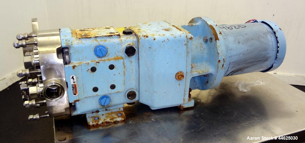 Used WaukeshaUniversal 2 Rotary Positive Displacement Pump, Model 030U2, 316 Stainless Steel.  Approximate capacity 36 gallons per minute 200 psi at 600 rpm.  .060 Gallon displacement per revolution....